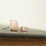 Mini stud earrings . Asymme..