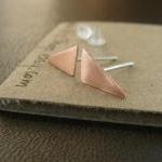 Tiny triangle earrings . Co..