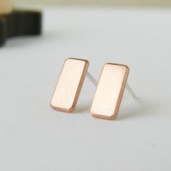 Geometric earrings . Small copper studs